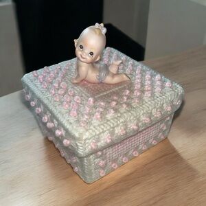 Adorable Vintage Baby Figurine on Knitted Box